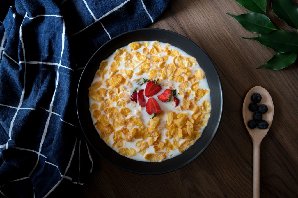 Photo by Tiard Schulz 
Photo of cereal bowl with strawberries and berries